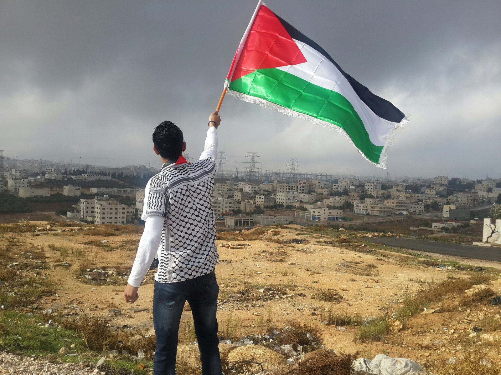 man waving flag